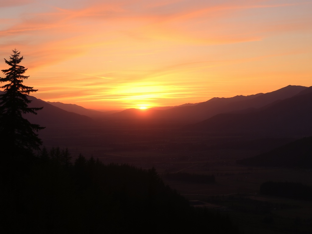 wide view chilliwack valley sunset warm light farmland mountains peaceful horizon