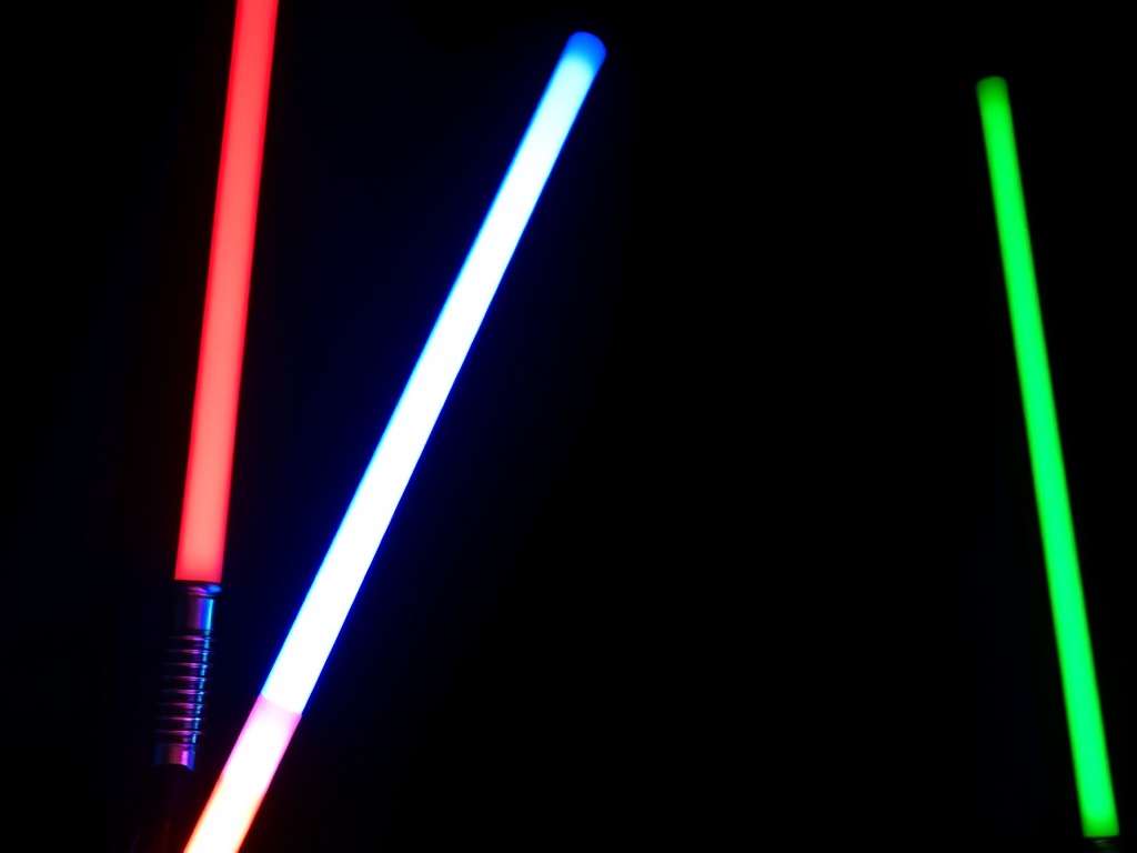 Star Wars lightsabers illuminated in dark room