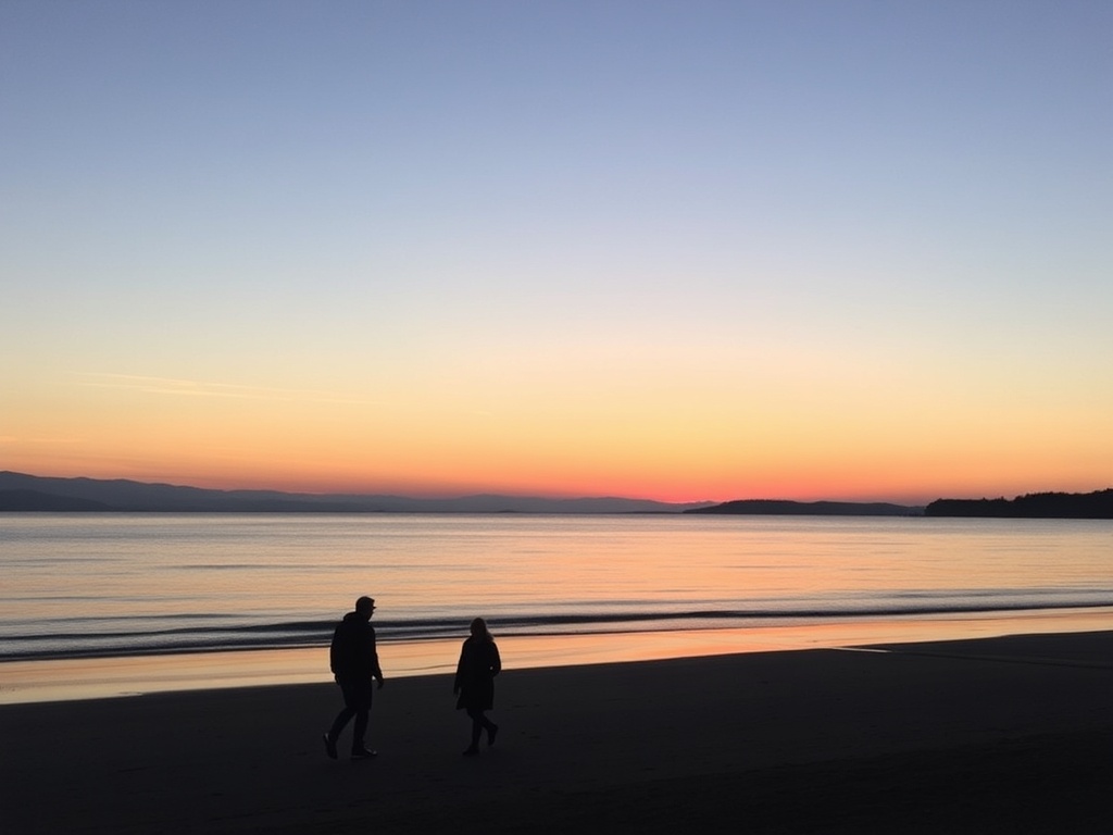 sunset silhouettes walking Parksville beach calm ocean pastel sky Vancouver Island