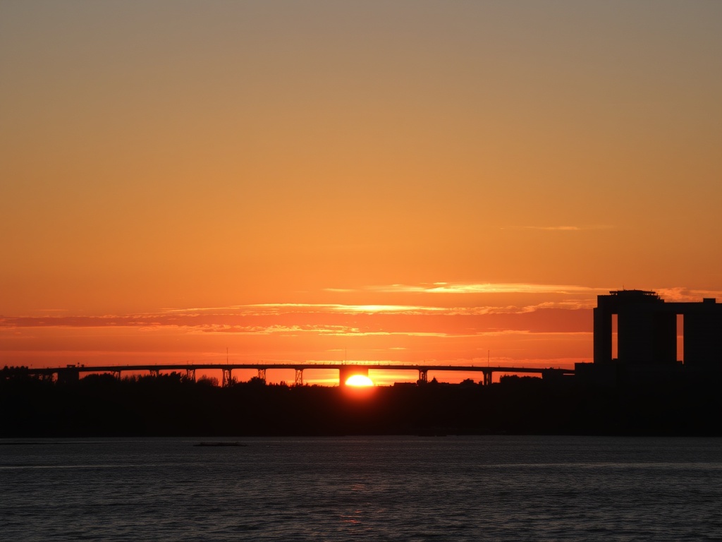 golden hour sunset over Ottawa River with warm tones and calm water