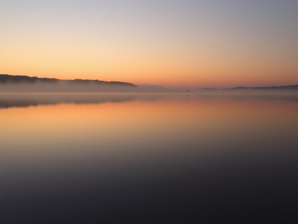 calm lake at sunrise with still water, minimalist composition, peaceful and reflective mood